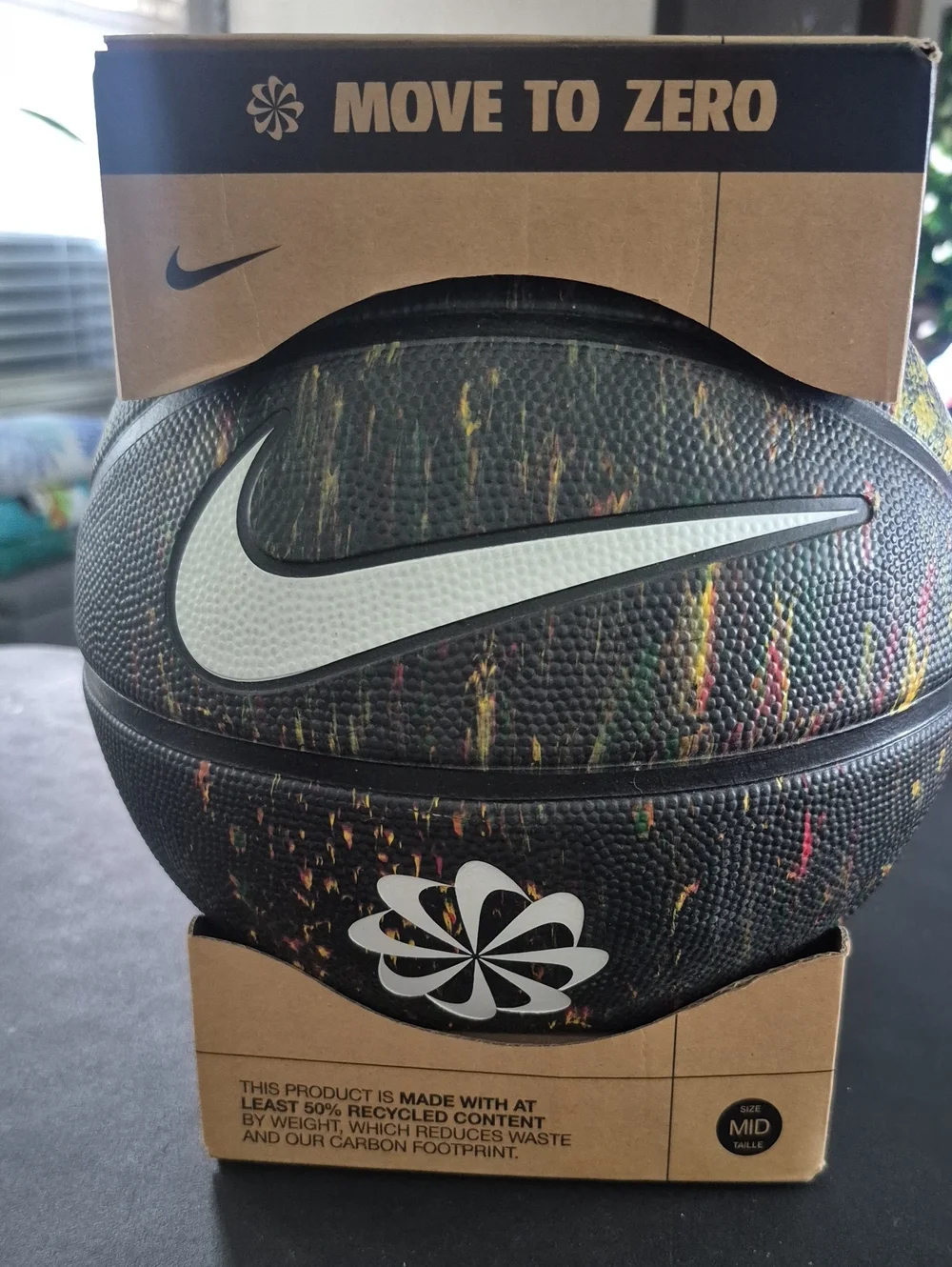 Nike Black Basketball with White Swoosh and Multicolor Specks